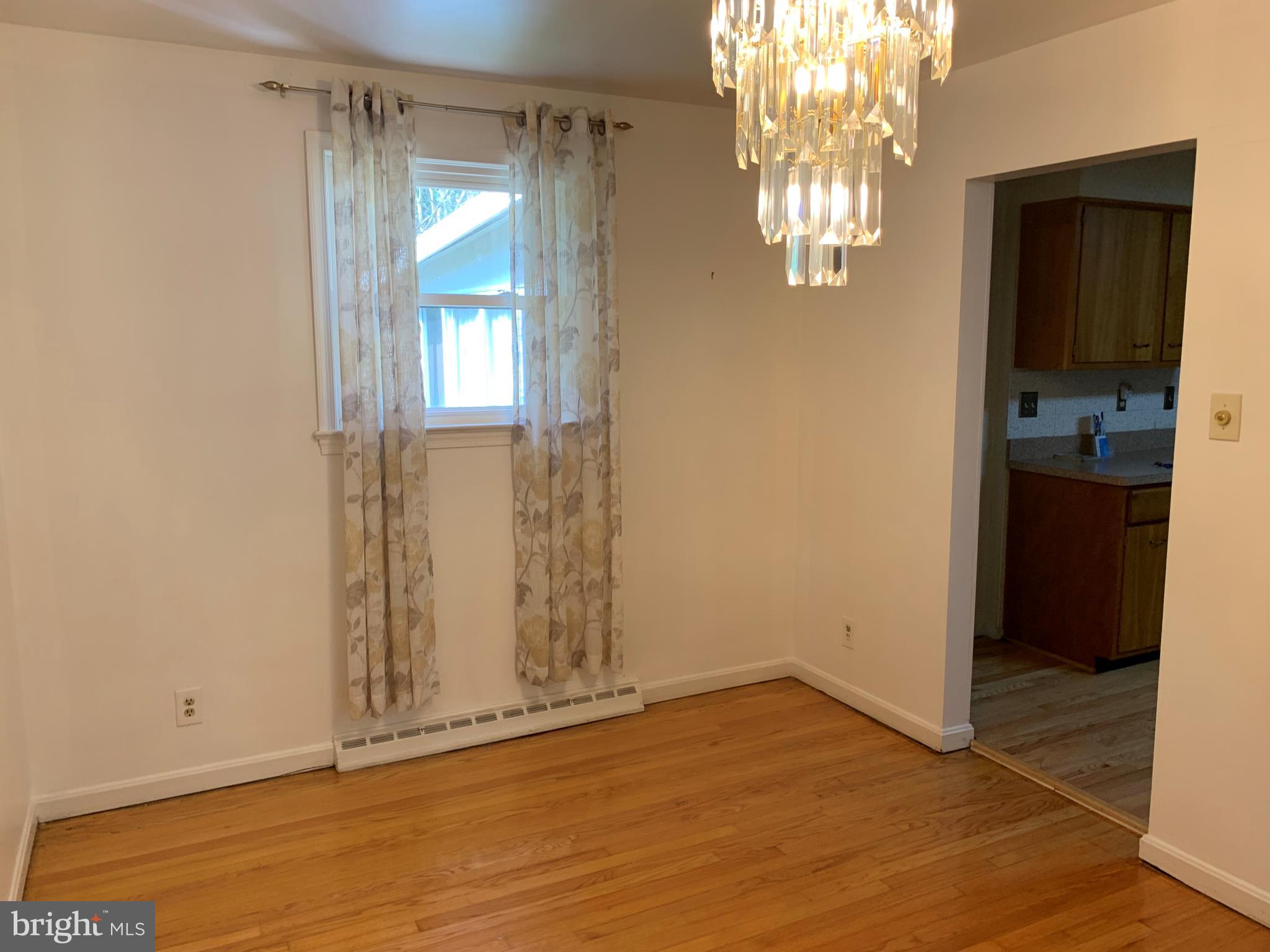 5317 Tolson Road Temple Hills, MD 20748 - Photo 5 of 23 VIEW OF DINING ROOM ENTRANCE TO KITCHEN