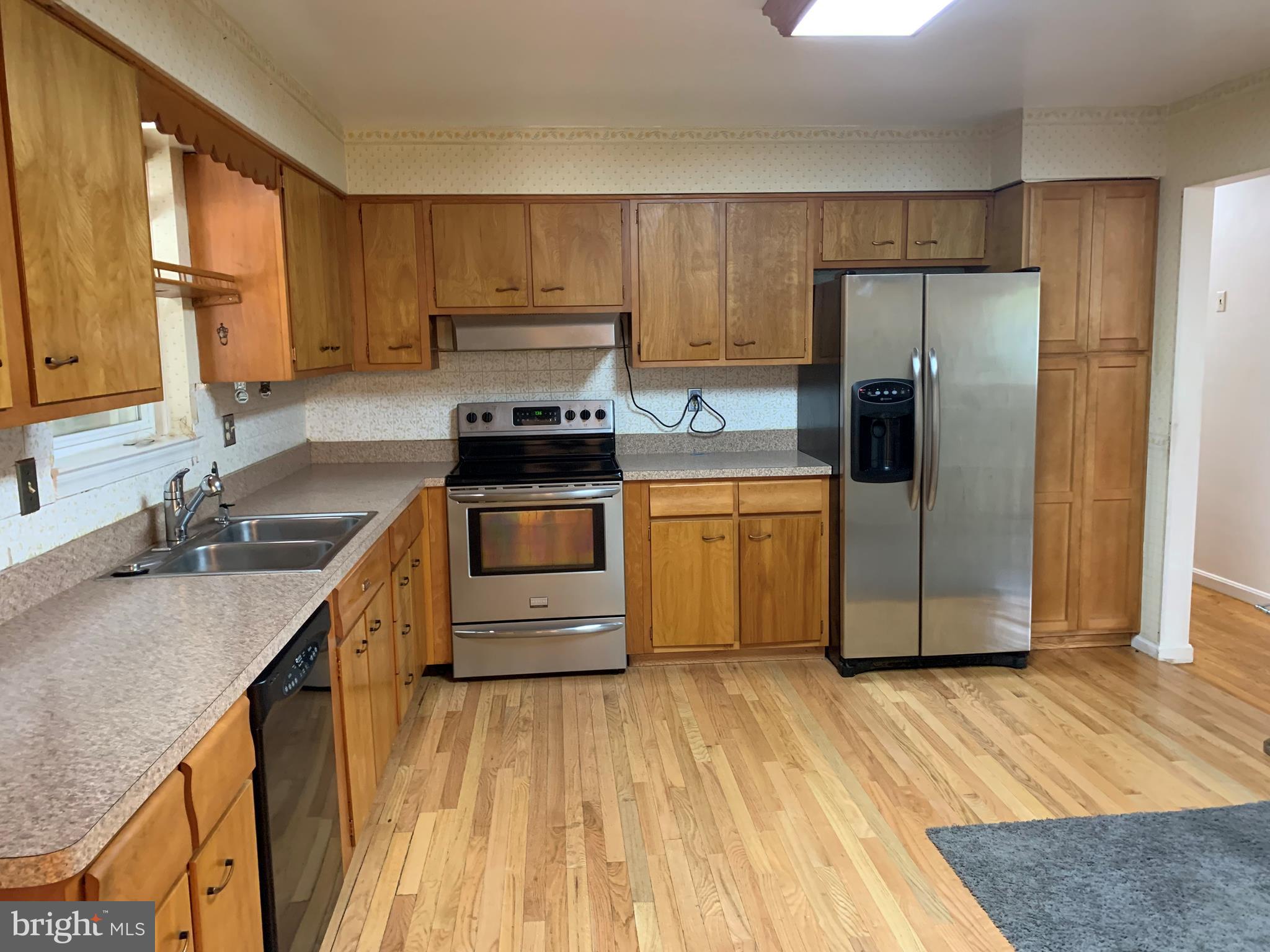 5317 Tolson Road Temple Hills, MD 20748 - Photo 6 of 23 KITCHEN WITH STAINLESS STEEL APPLIANCES