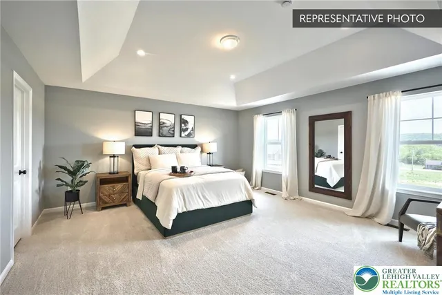 a bed room with a bed and a large mirror