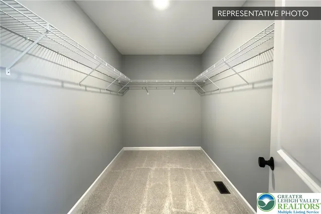 a view of a room with racks on the wall