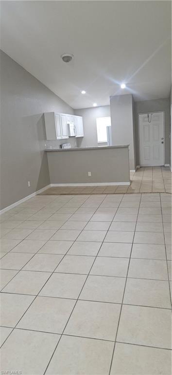 4530 30th Street Southwest Lehigh Acres, FL 33973 - Photo 2 of 6 a view of an empty room and window