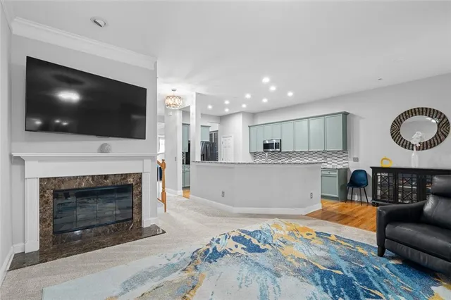 a bedroom with a couch and a window