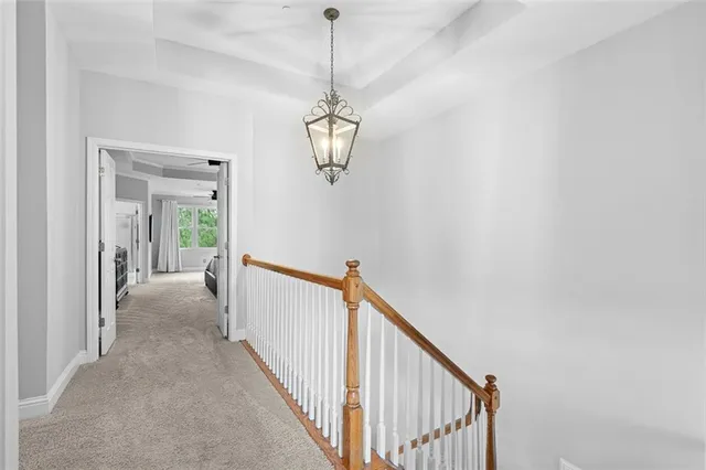 a bathroom with a tub shower and sink