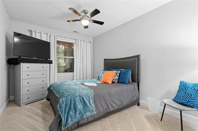 a front view of a house with a garage