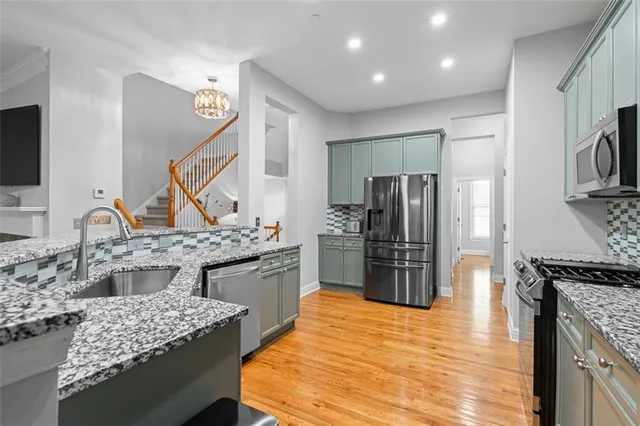 a bedroom with a bed and a television