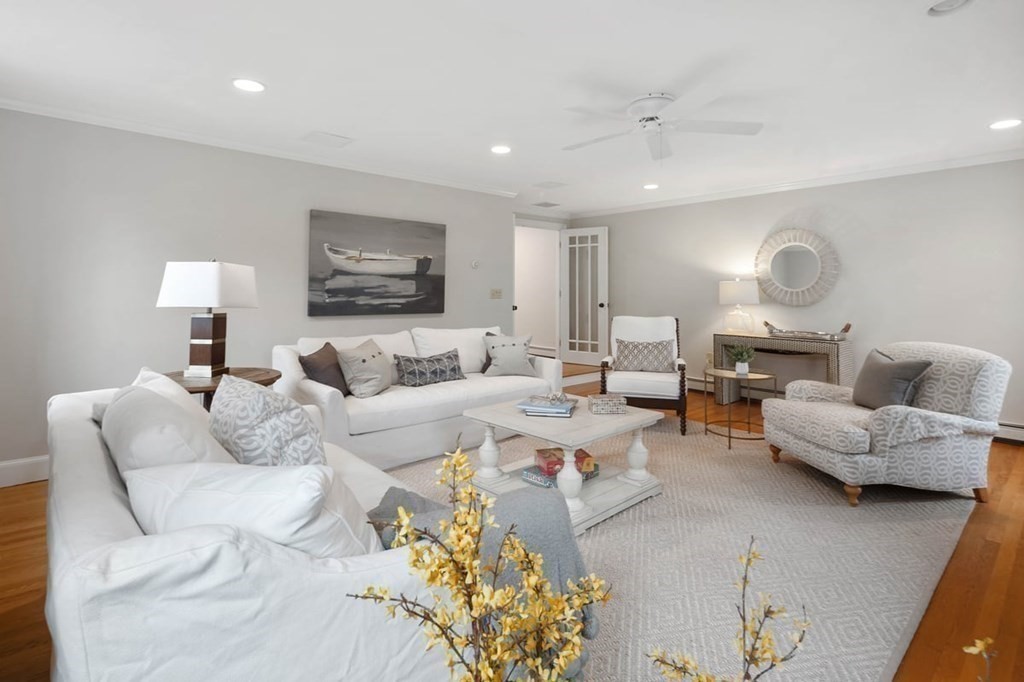 10 Union Street Hingham, MA 02043 - Photo 14 of 40 a living room with furniture and a lamp