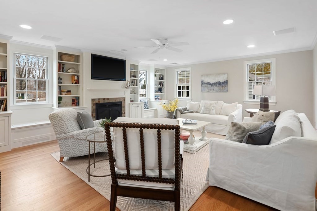 10 Union Street Hingham, MA 02043 - Photo 15 of 40 a living room with furniture fireplace and a flat screen tv