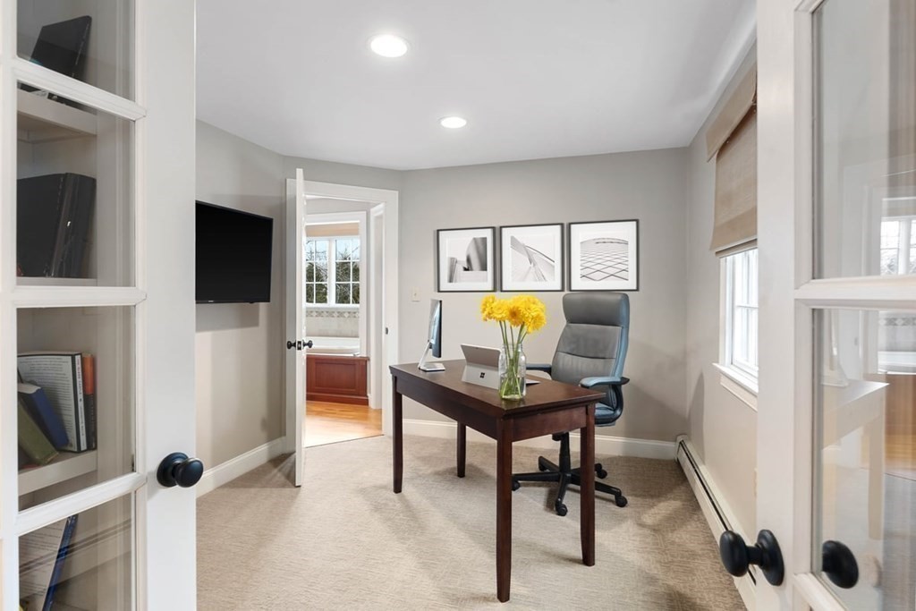 10 Union Street Hingham, MA 02043 - Photo 24 of 40 a view of a workspace with a window and bathroom