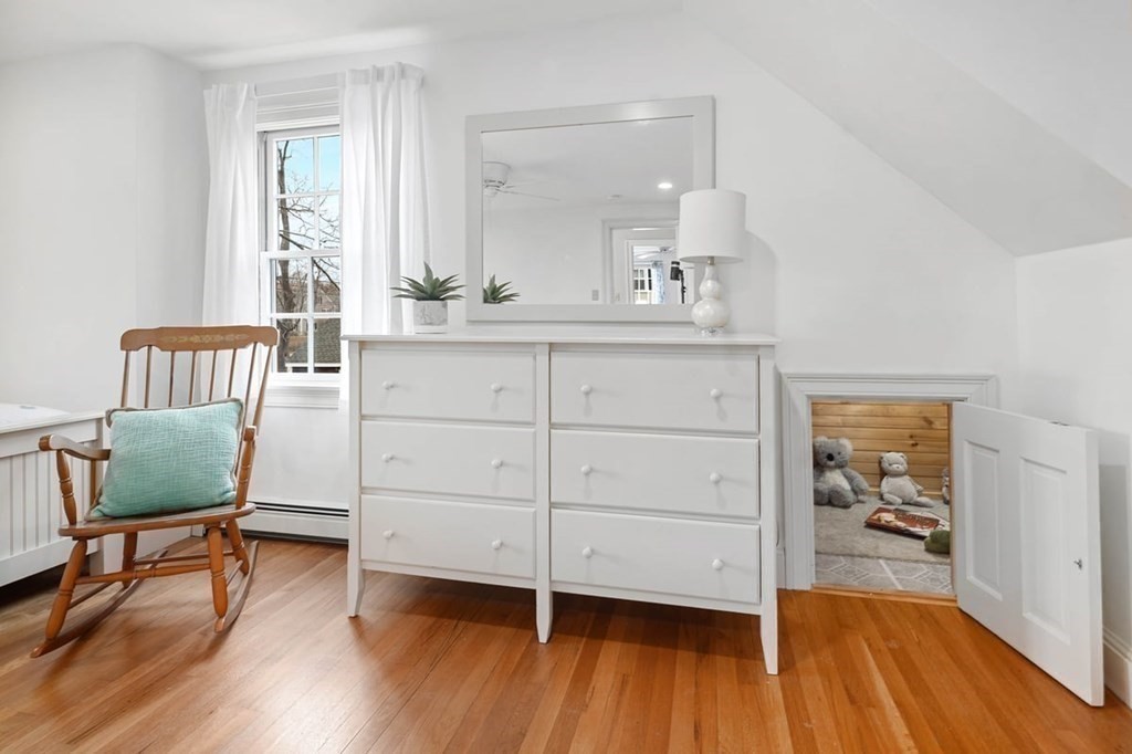 10 Union Street Hingham, MA 02043 - Photo 31 of 40 a view of a bedroom with furniture and wooden floor
