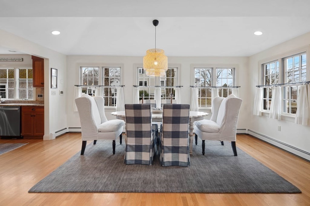 10 Union Street Hingham, MA 02043 - Photo 10 of 40 a living room with patio furniture and a chandelier