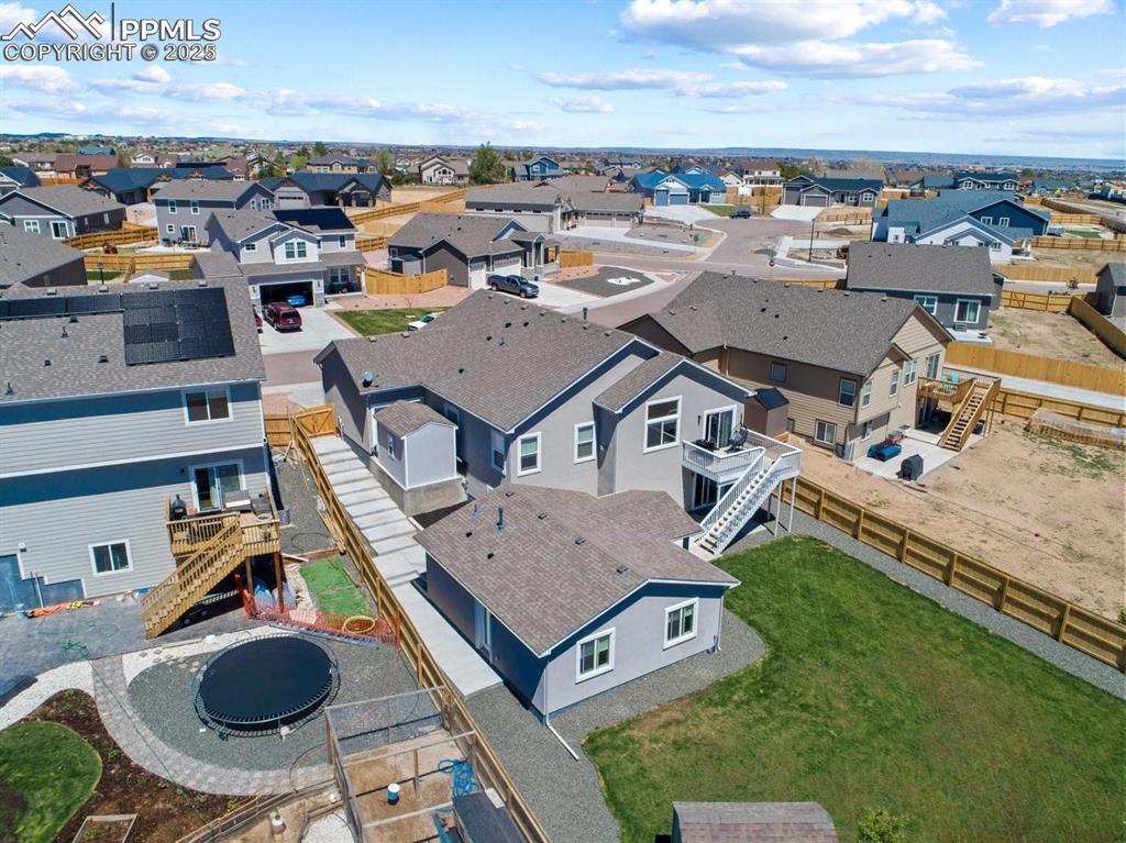 10052 Bracknell Place Peyton, CO 80831 - Photo 36 of 36 an aerial view of residential houses with outdoor space