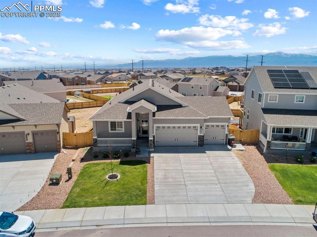10052 Bracknell Place Peyton, CO 80831 - Photo 4 of 36 an aerial view of a house with a yard