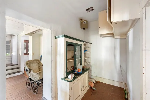 a room with furniture and a window