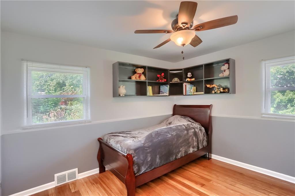 3275 Ridge Rd Extension Freedom, PA 15042 - Photo 12 of 25 A guest bedroom on the main level is bright and roomy with ample storage.