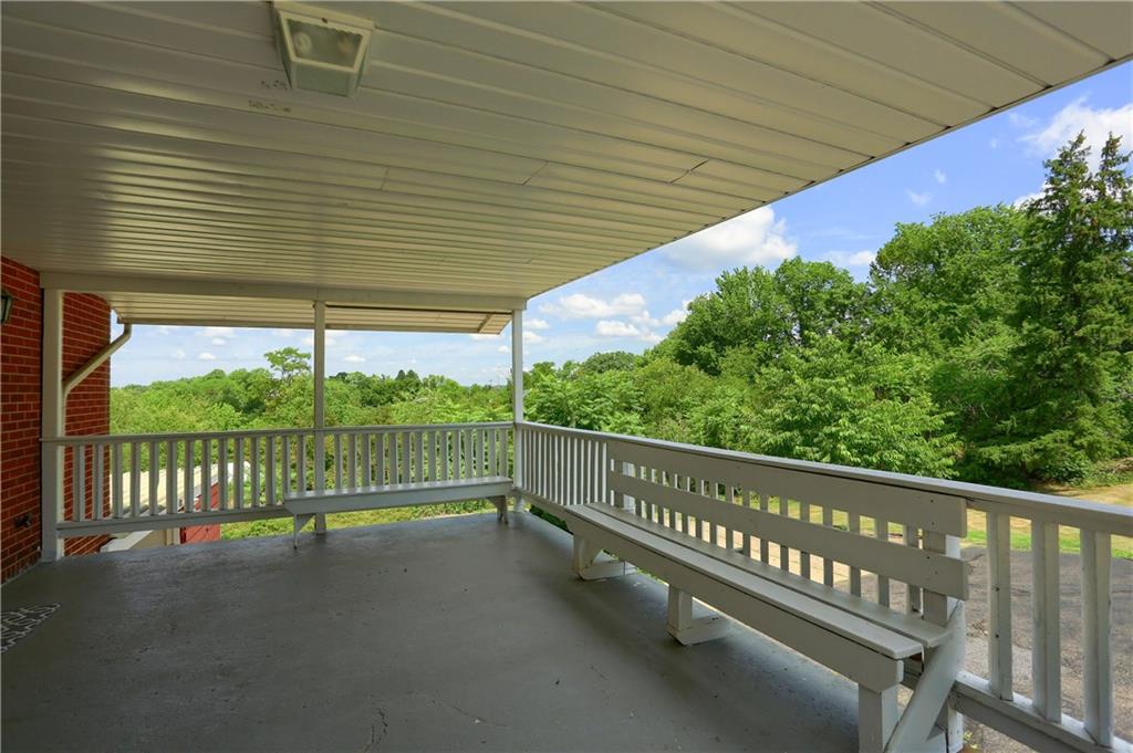 3275 Ridge Rd Extension Freedom, PA 15042 - Photo 23 of 25 The oversized covered porch is perfect for meals outside and gatherings with friends and family. Rain or shine!