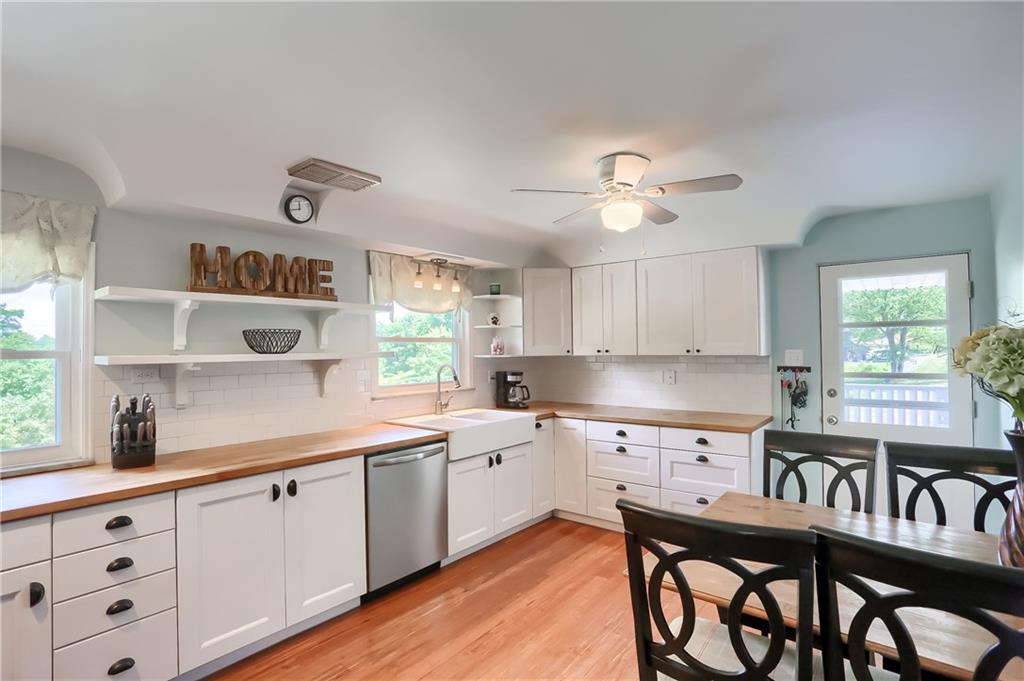 3275 Ridge Rd Extension Freedom, PA 15042 - Photo 6 of 25 The kitchen provides an eat in area and access to the covered porch.