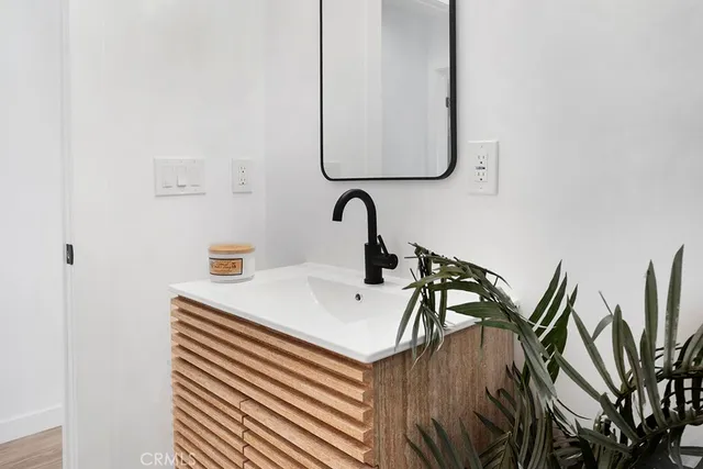 a kitchen with stainless steel appliances a refrigerator and a stove top oven