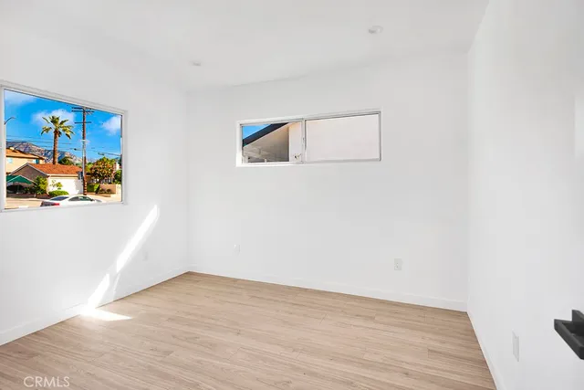 a kitchen with stainless steel appliances a stove a sink and a refrigerator