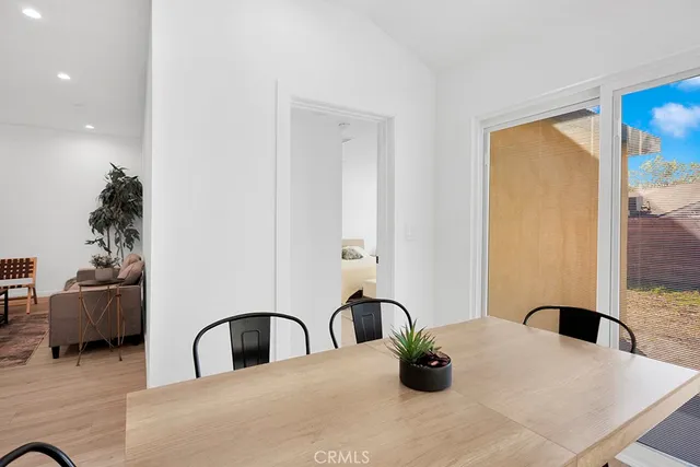 a kitchen with granite countertop a sink and a window