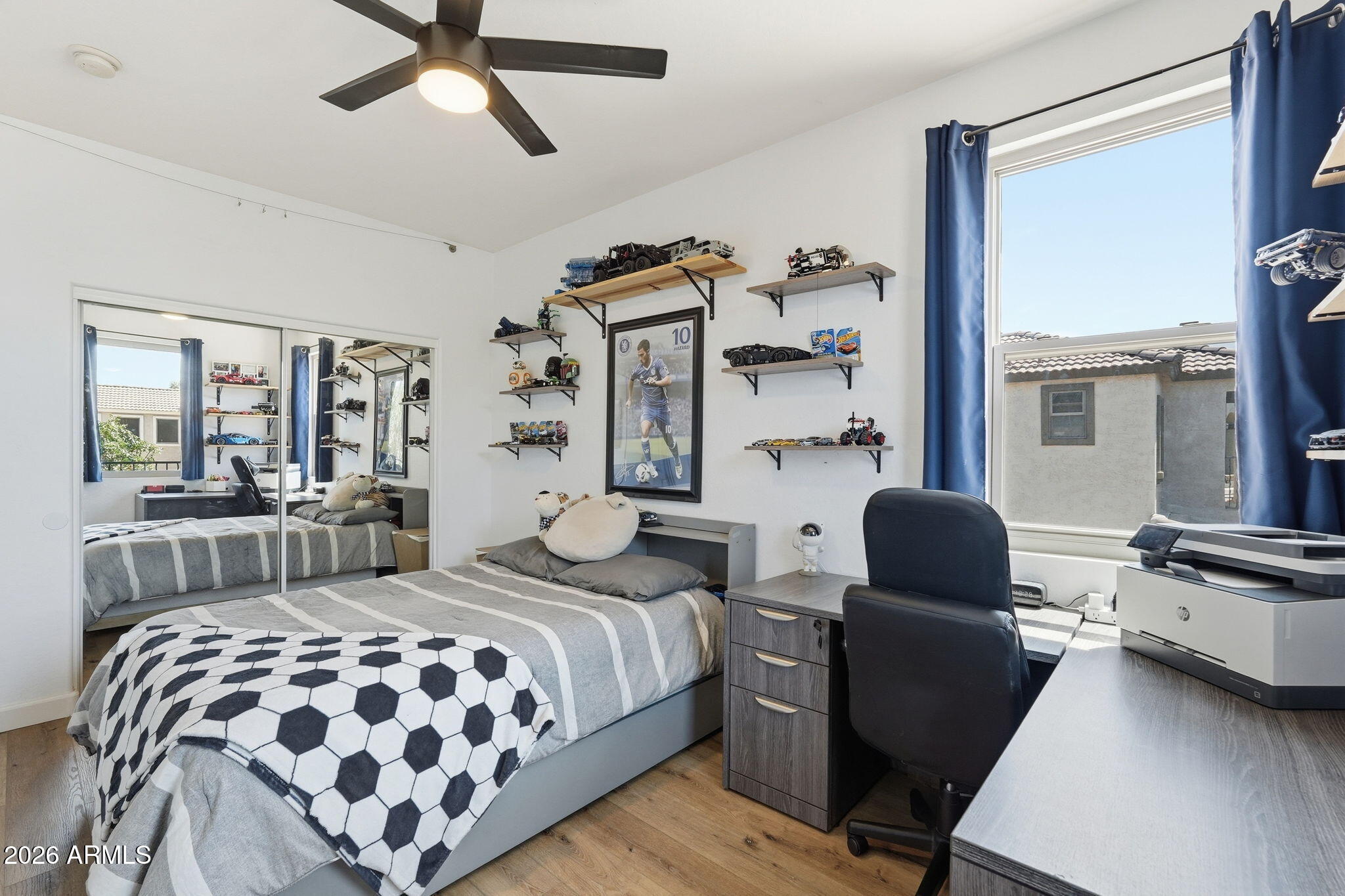 4184 East Trigger Way Gilbert, AZ 85297 - Photo 28 of 51 a bedroom with furniture and windows