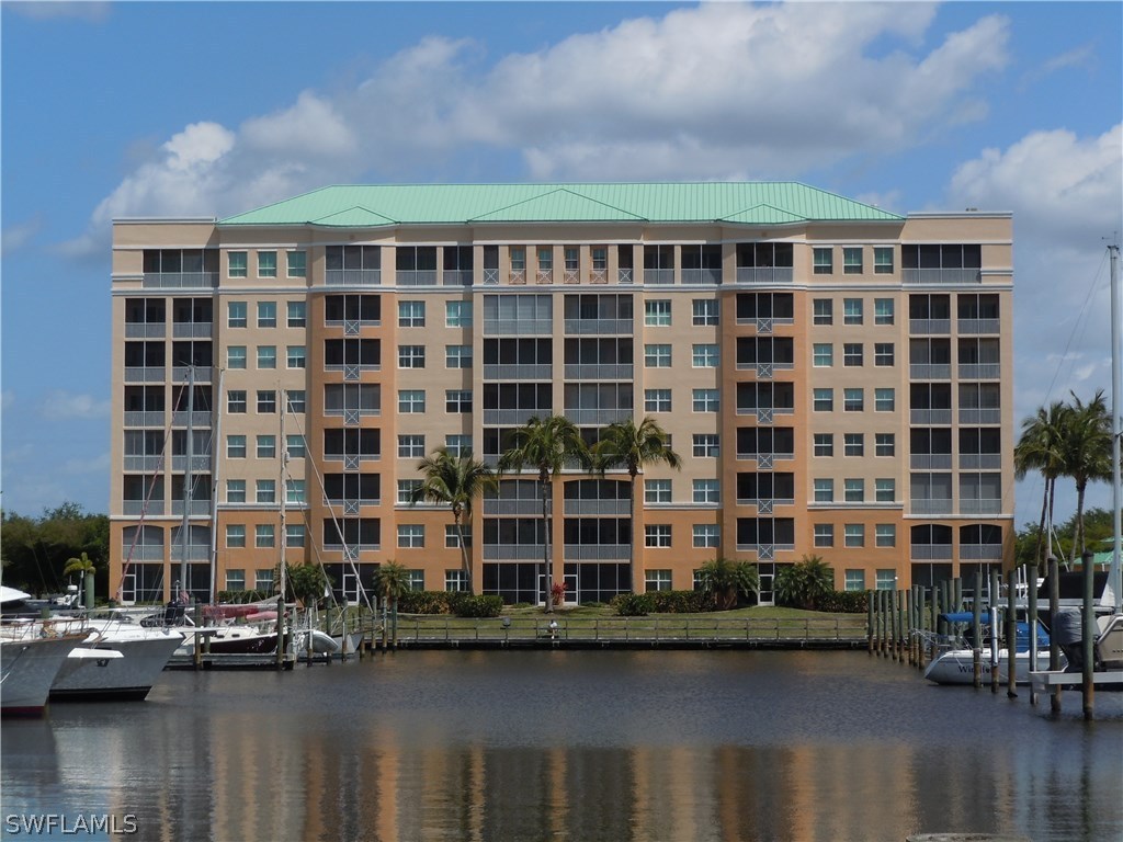 2060 Matecumbe Key Road, Unit 2207 Punta Gorda, FL 33955 - Photo 1 of 21 a front view of a building with lake view