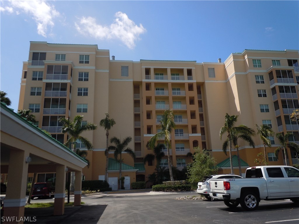 2060 Matecumbe Key Road, Unit 2207 Punta Gorda, FL 33955 - Photo 16 of 21 a view of a building and a street view