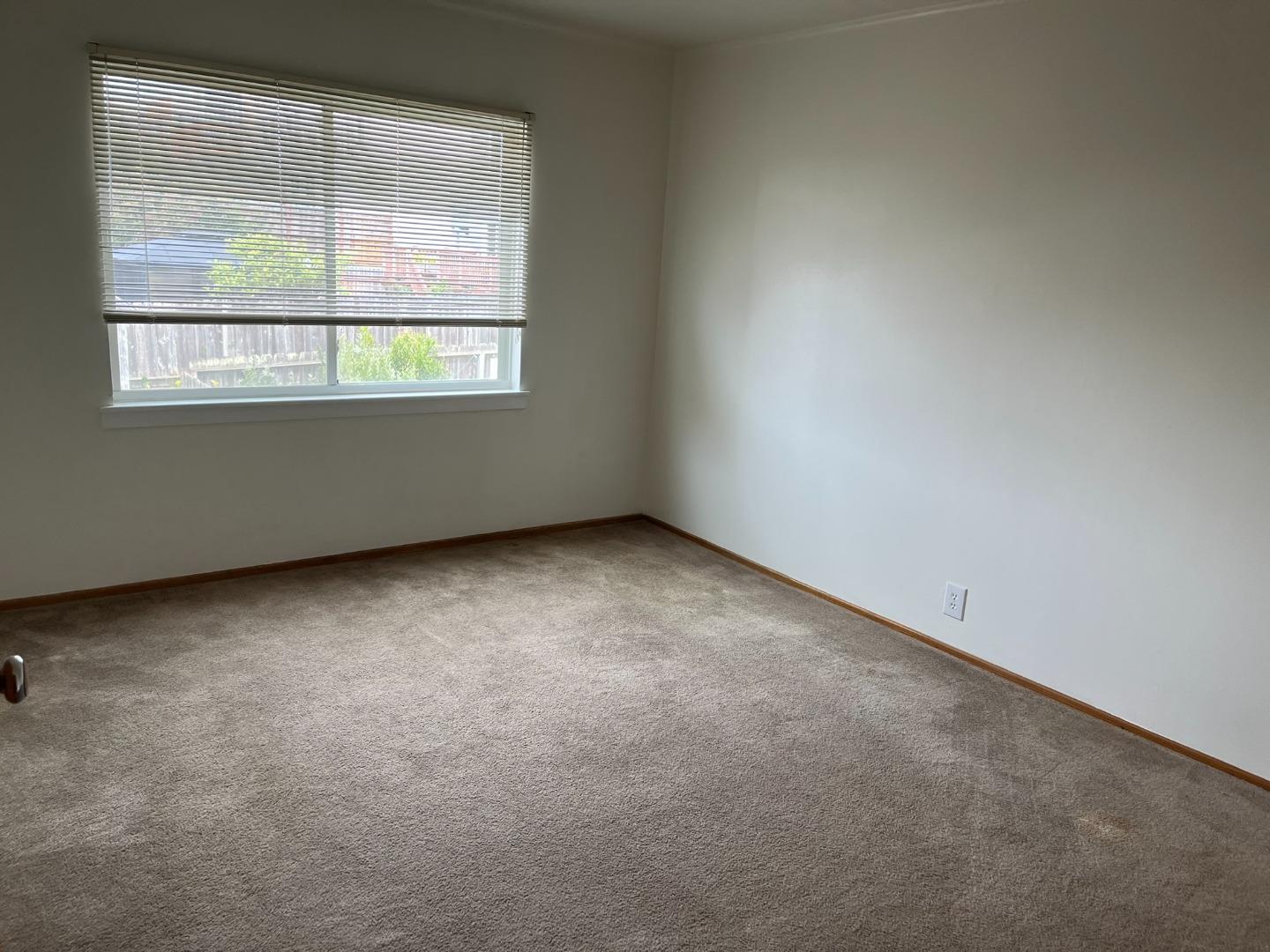 2028-2030 Taraval Street San Francisco, CA 94116 - Photo 17 of 18 an empty room with a window