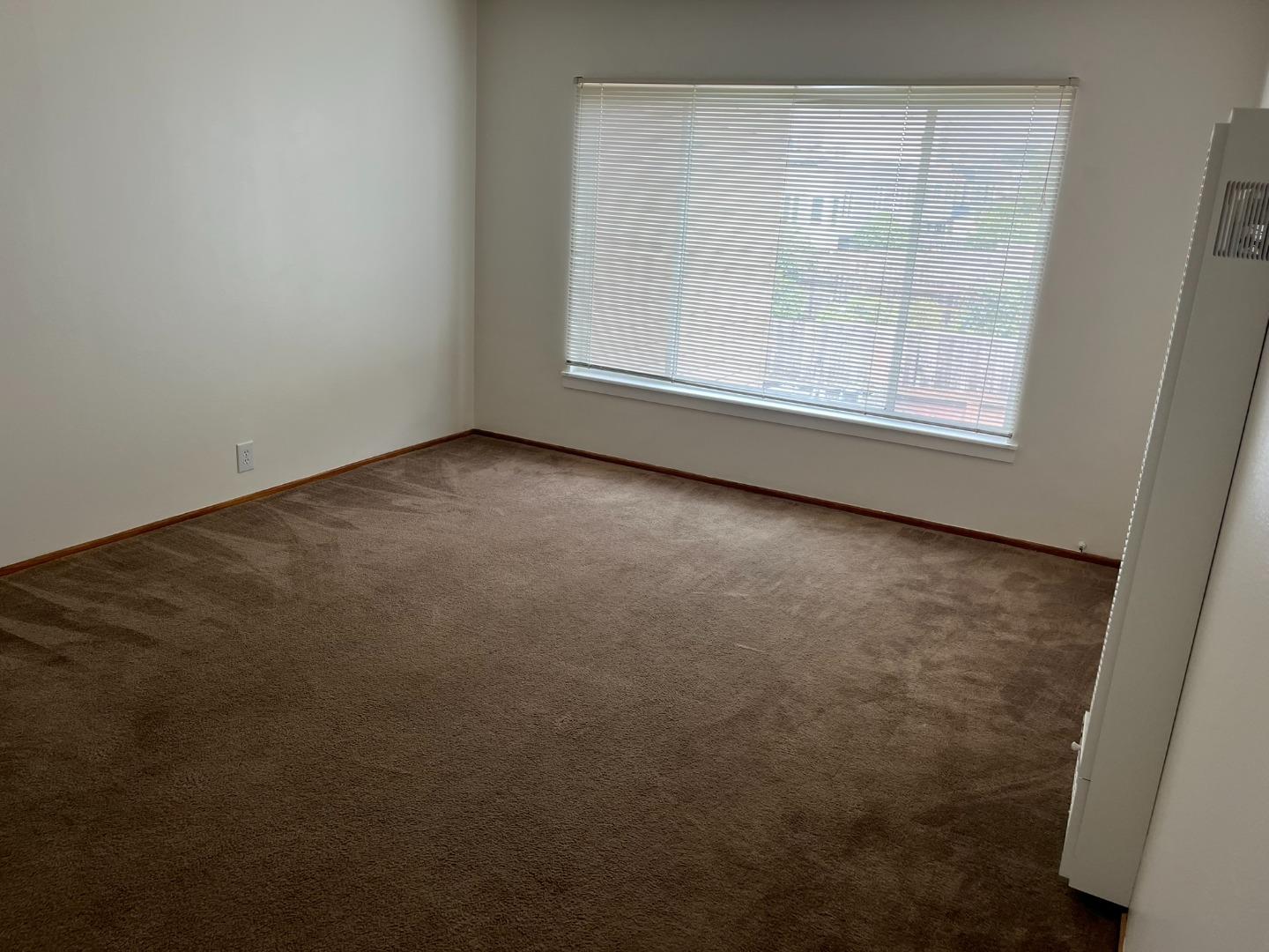 2028-2030 Taraval Street San Francisco, CA 94116 - Photo 18 of 18 an empty room with a empty space and window