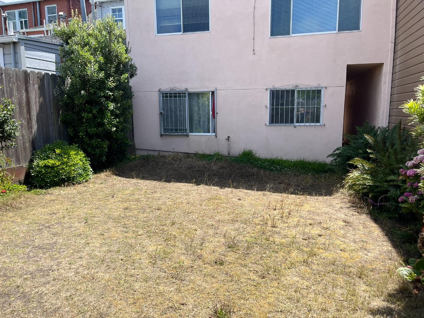 2028-2030 Taraval Street San Francisco, CA 94116 - Photo 2 of 18 a view of white house with a yard