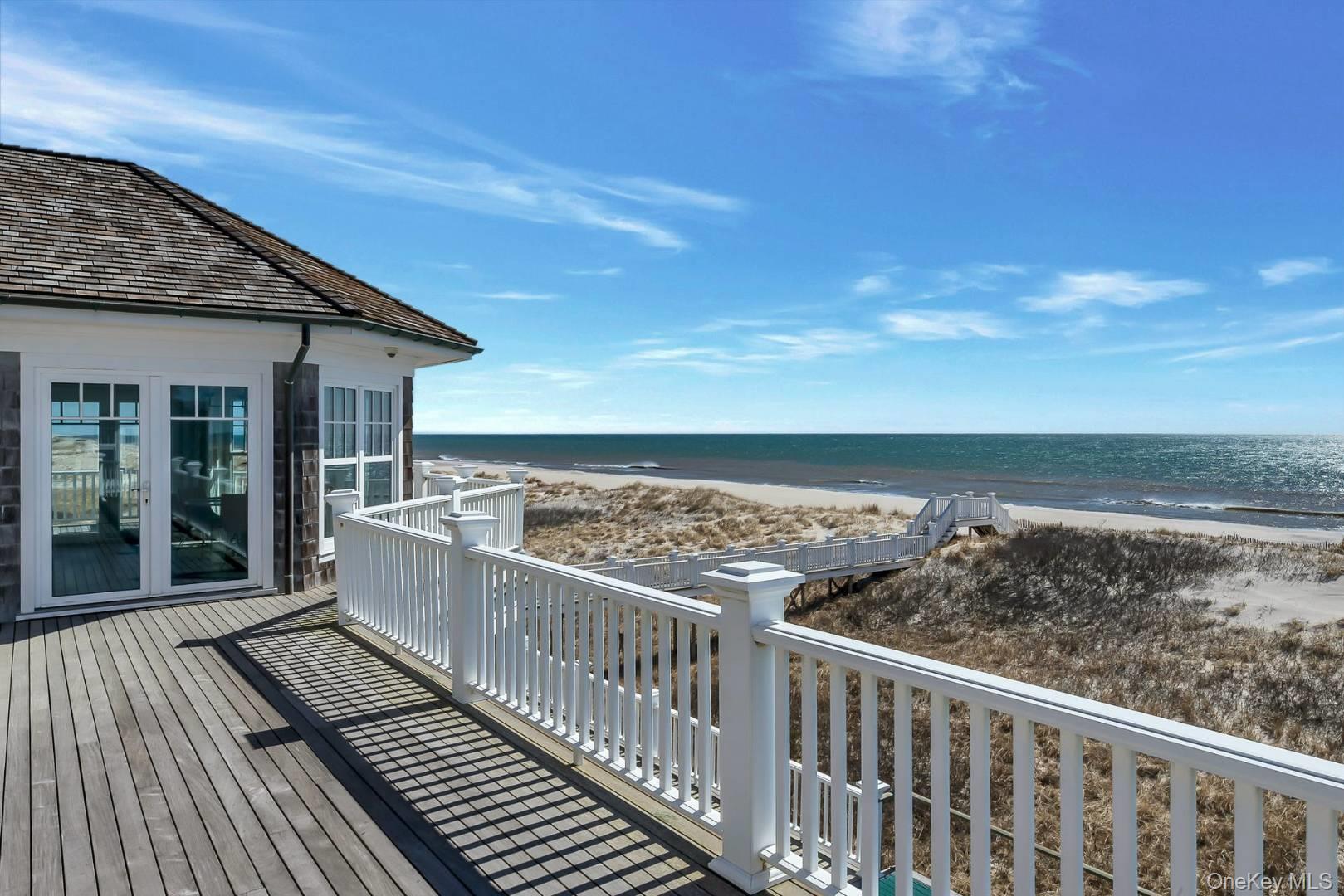 19 Dune Road East Quogue, NY 11959 - Photo 17 of 19 a view of a balcony with wooden floor