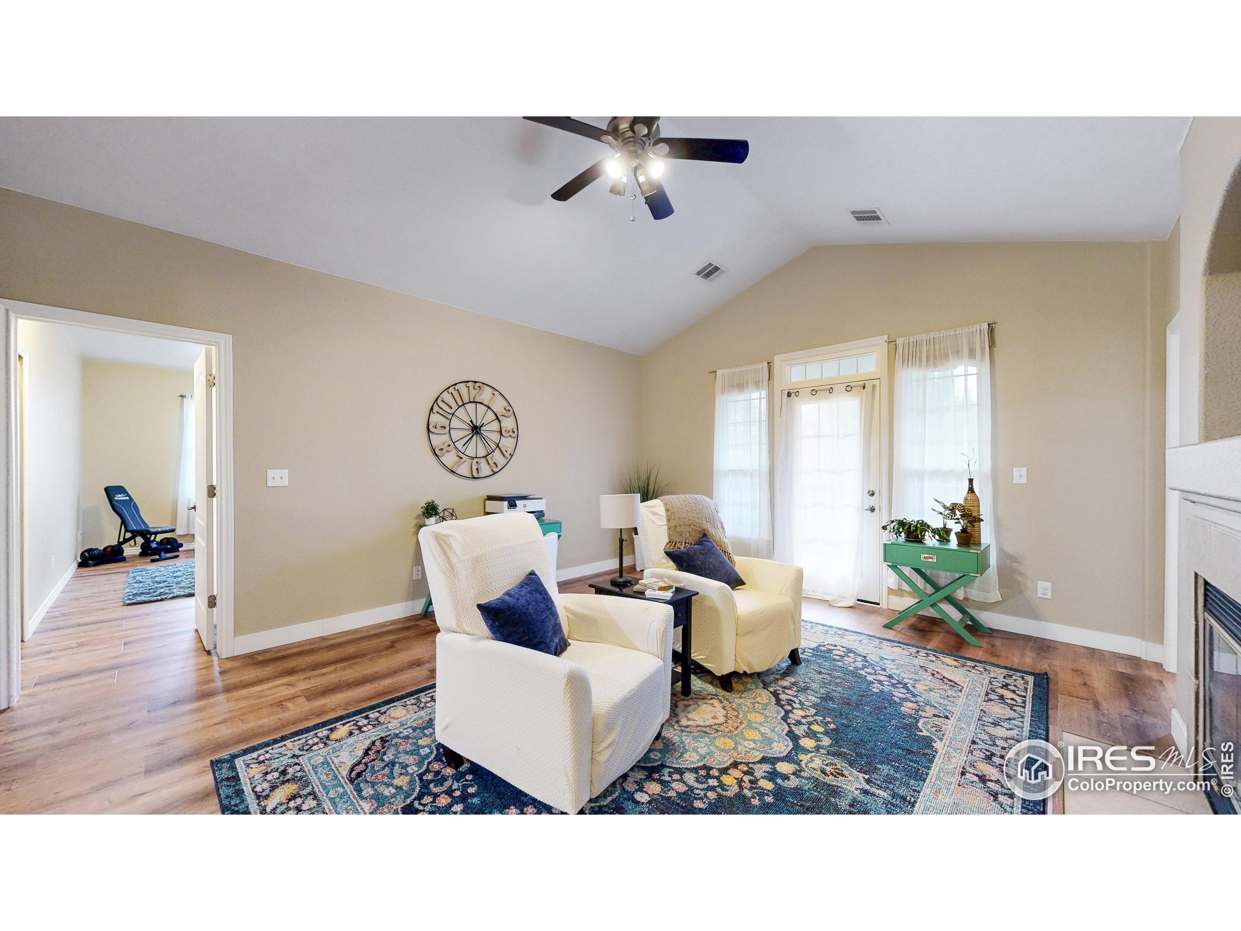 4672 West 20th Street Road, Unit 1823 Greeley, CO 80634 - Photo 4 of 24 a living room with furniture