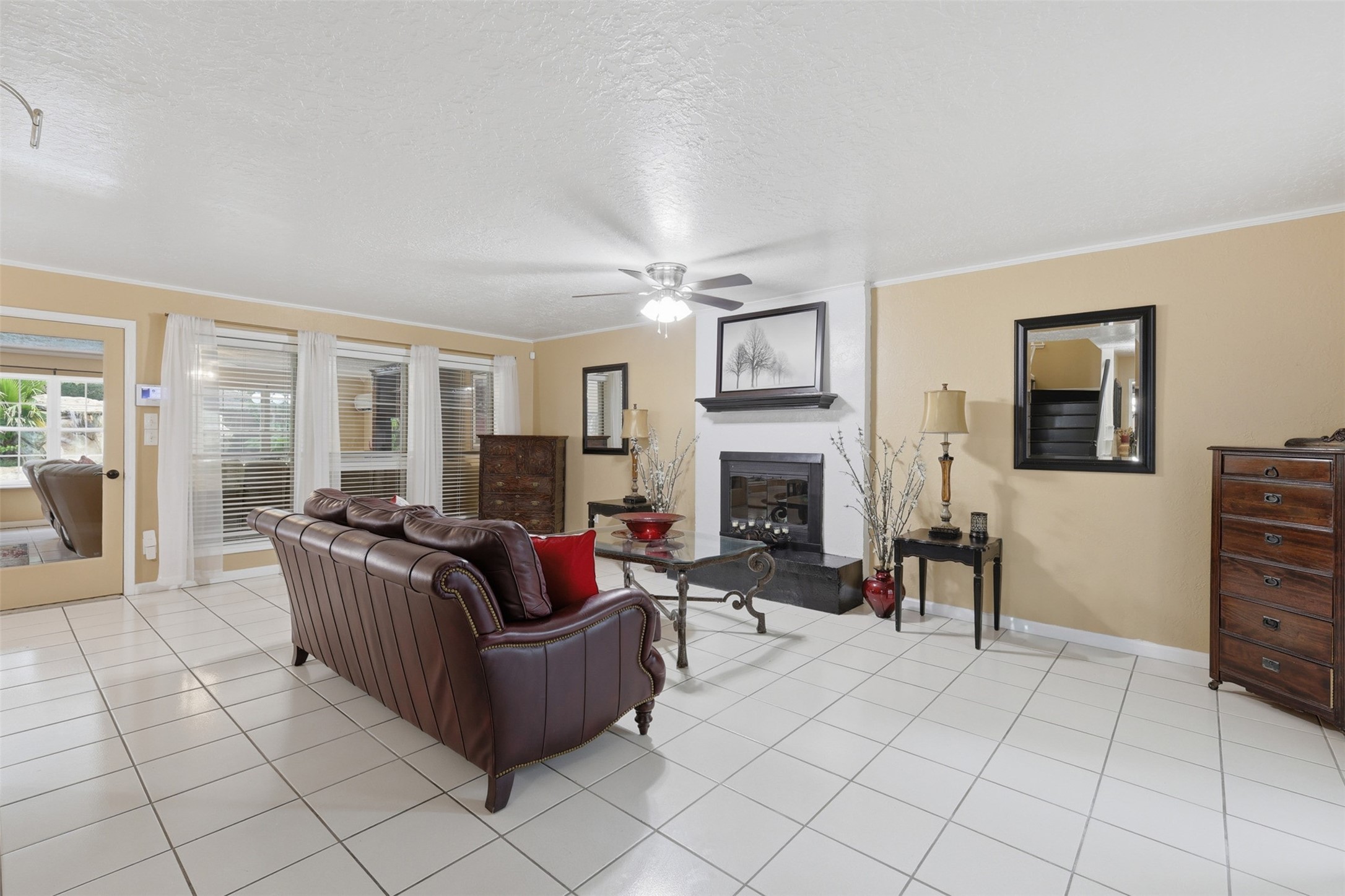 7010 River Mill Drive Spring, TX 77379 - Photo 6 of 29 a living room with furniture and a fireplace