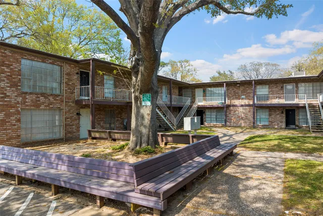 a view of house with yard