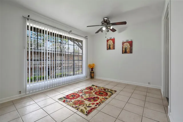 a white refrigerator freezer sitting inside of a kitchen