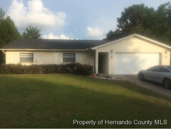7400 Dundee Way Weeki Wachee, FL 34613 - Photo 1 of 14