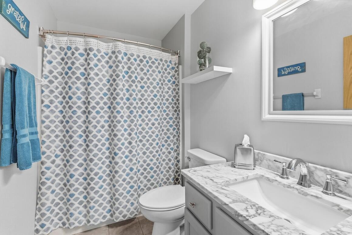 1189 Mockingbird Drive Oconomowoc, WI 53066 - Photo 22 of 31 Updated Full Bath on Main Level