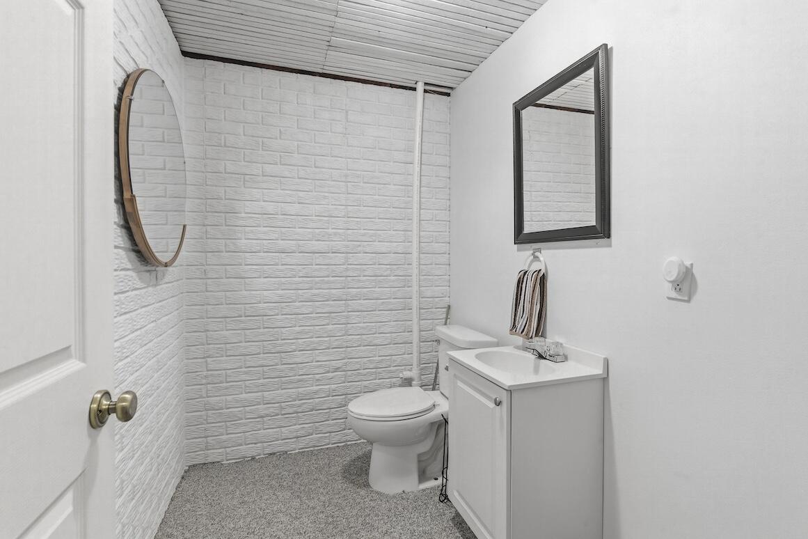 1189 Mockingbird Drive Oconomowoc, WI 53066 - Photo 29 of 31 Lower Level Half Bath