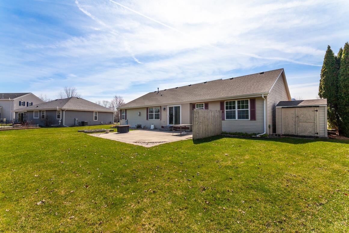 1189 Mockingbird Drive Oconomowoc, WI 53066 - Photo 4 of 31 Back w/Shed