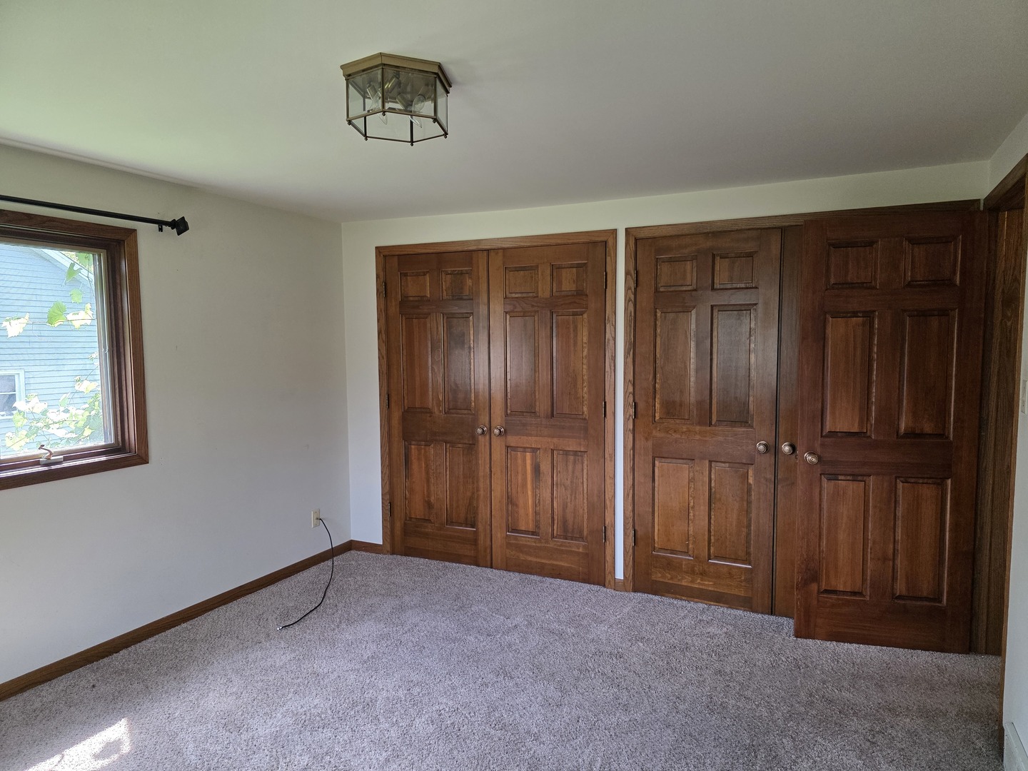 1546 Wheeler Street Woodstock, IL 60098 - Photo 19 of 32 an empty room with closet