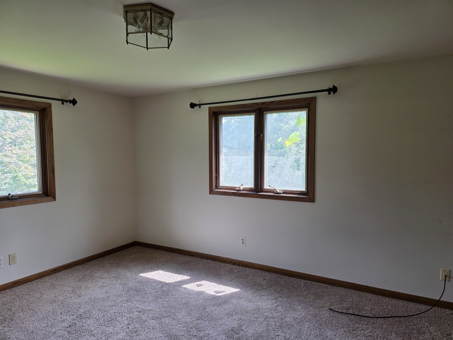 1546 Wheeler Street Woodstock, IL 60098 - Photo 23 of 32 an empty room with a window