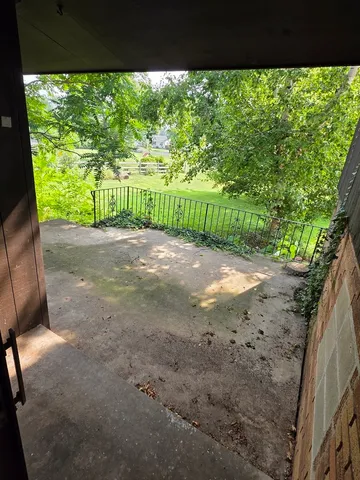 a view of a garden with an outdoor space