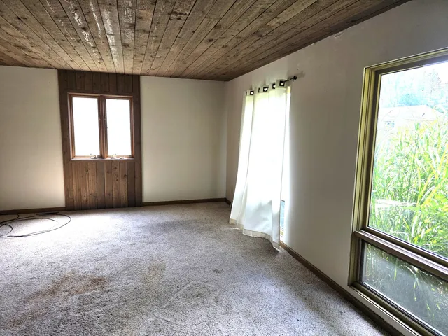 an empty room with windows