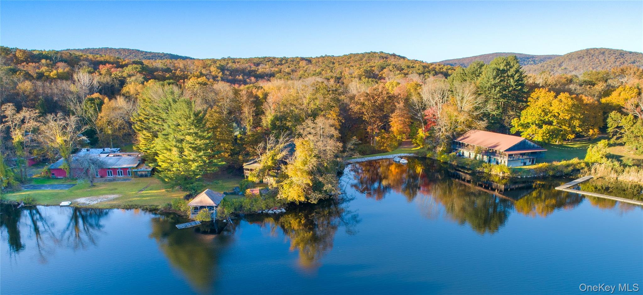 111 Ballyhack Road Brewster, NY 10509 - Photo 6 of 26 a view of a lake with a mountain in the background