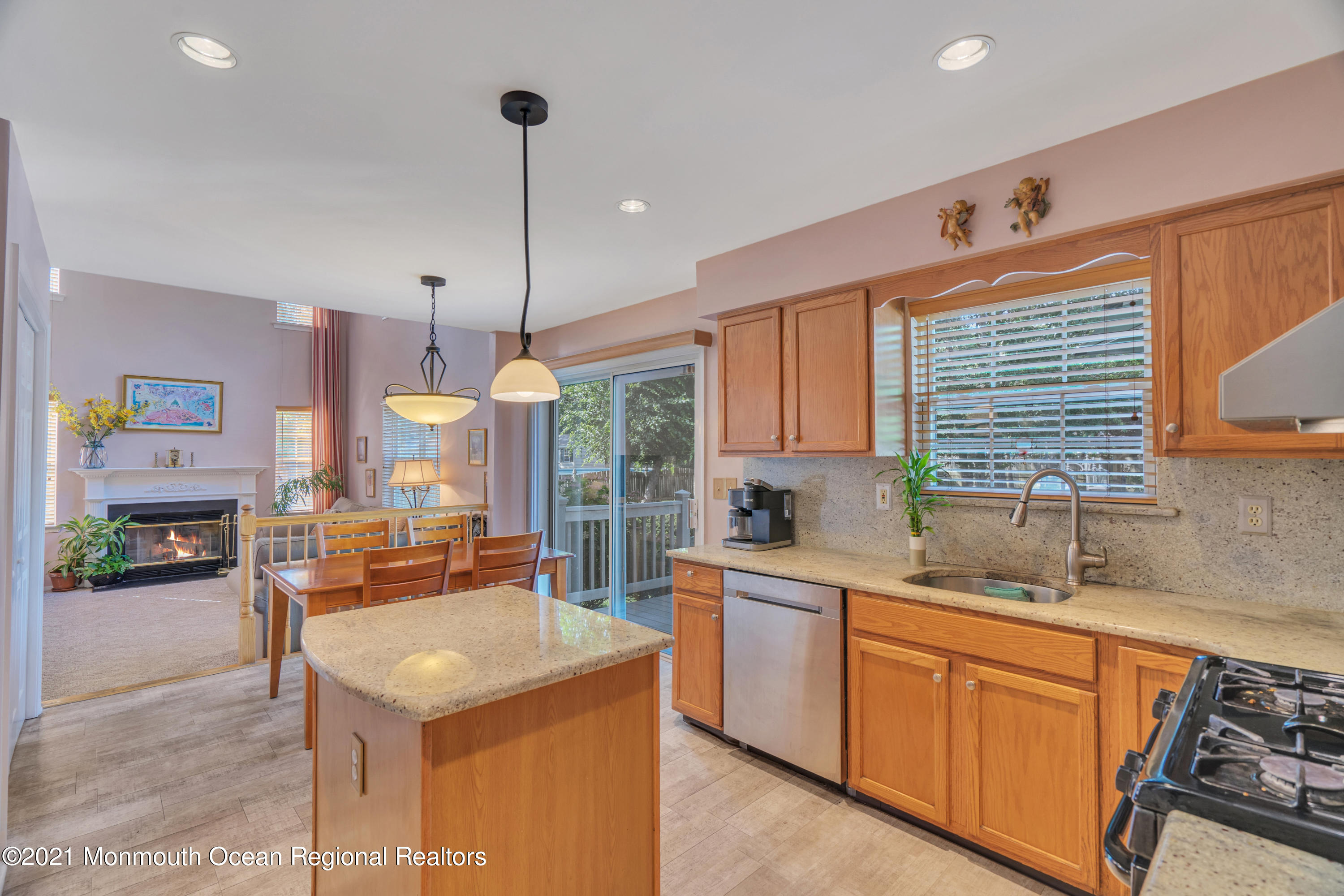 7 Sun Hollow Road Howell, NJ 07731 - Photo 12 of 31 a kitchen with stainless steel appliances granite countertop a sink stove and refrigerator