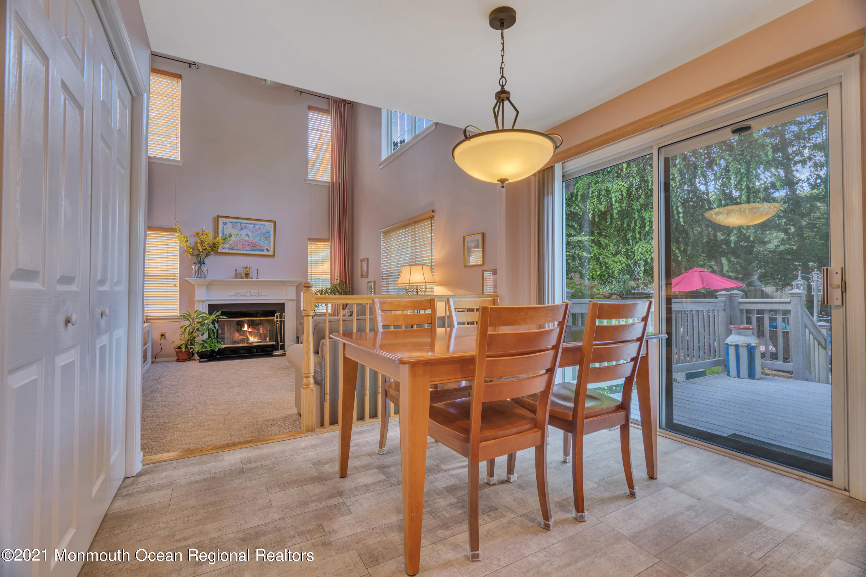 7 Sun Hollow Road Howell, NJ 07731 - Photo 13 of 31 a view of a dining room with furniture wooden floor and chandelier