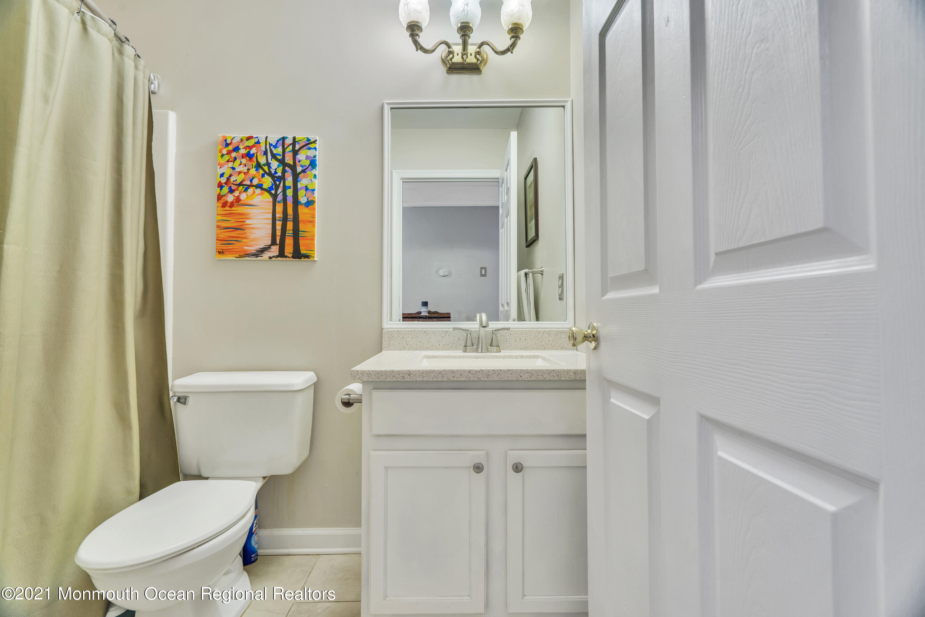 7 Sun Hollow Road Howell, NJ 07731 - Photo 24 of 31 a bathroom with a toilet sink and mirror