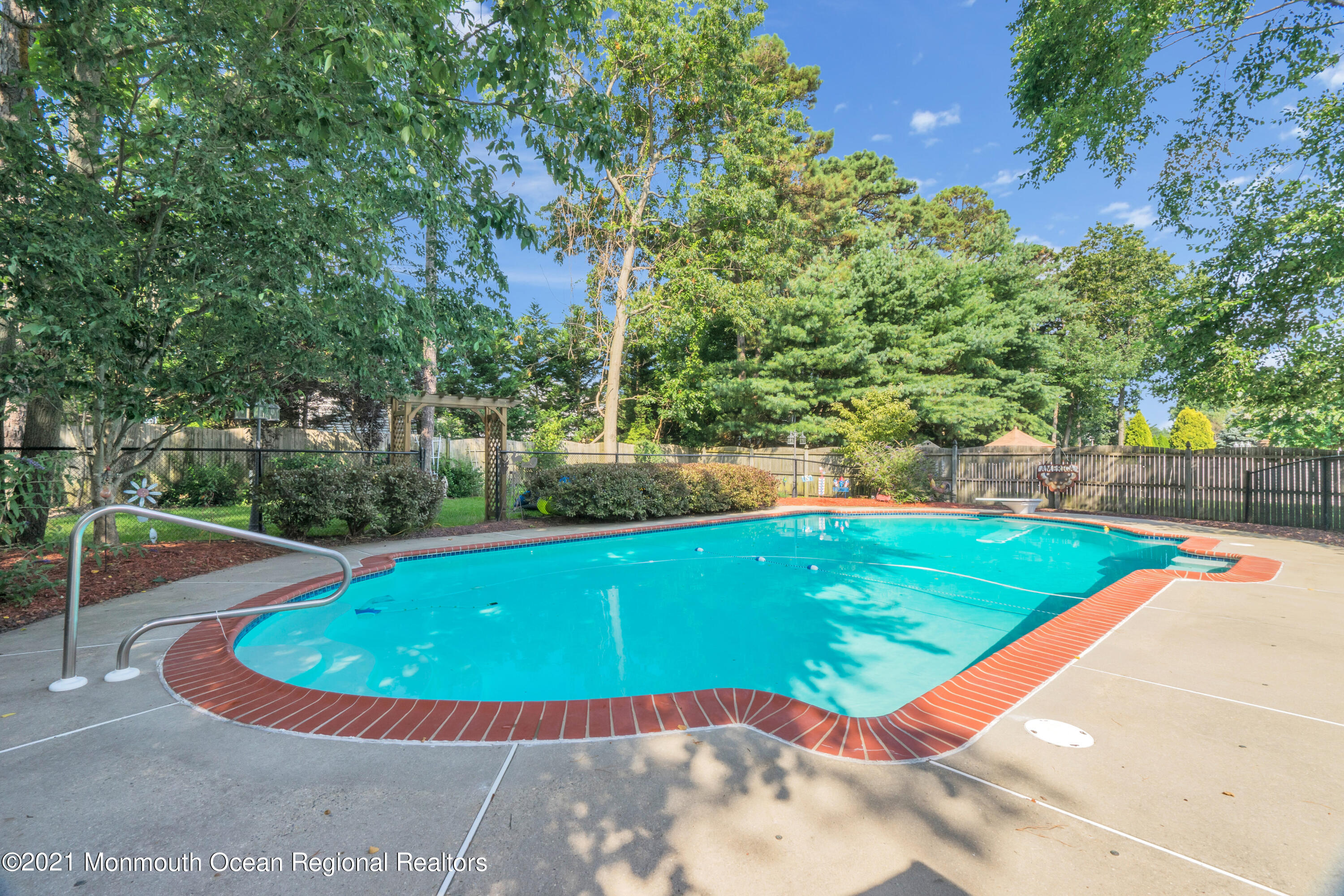 7 Sun Hollow Road Howell, NJ 07731 - Photo 27 of 31 a view of a swimming pool with a patio