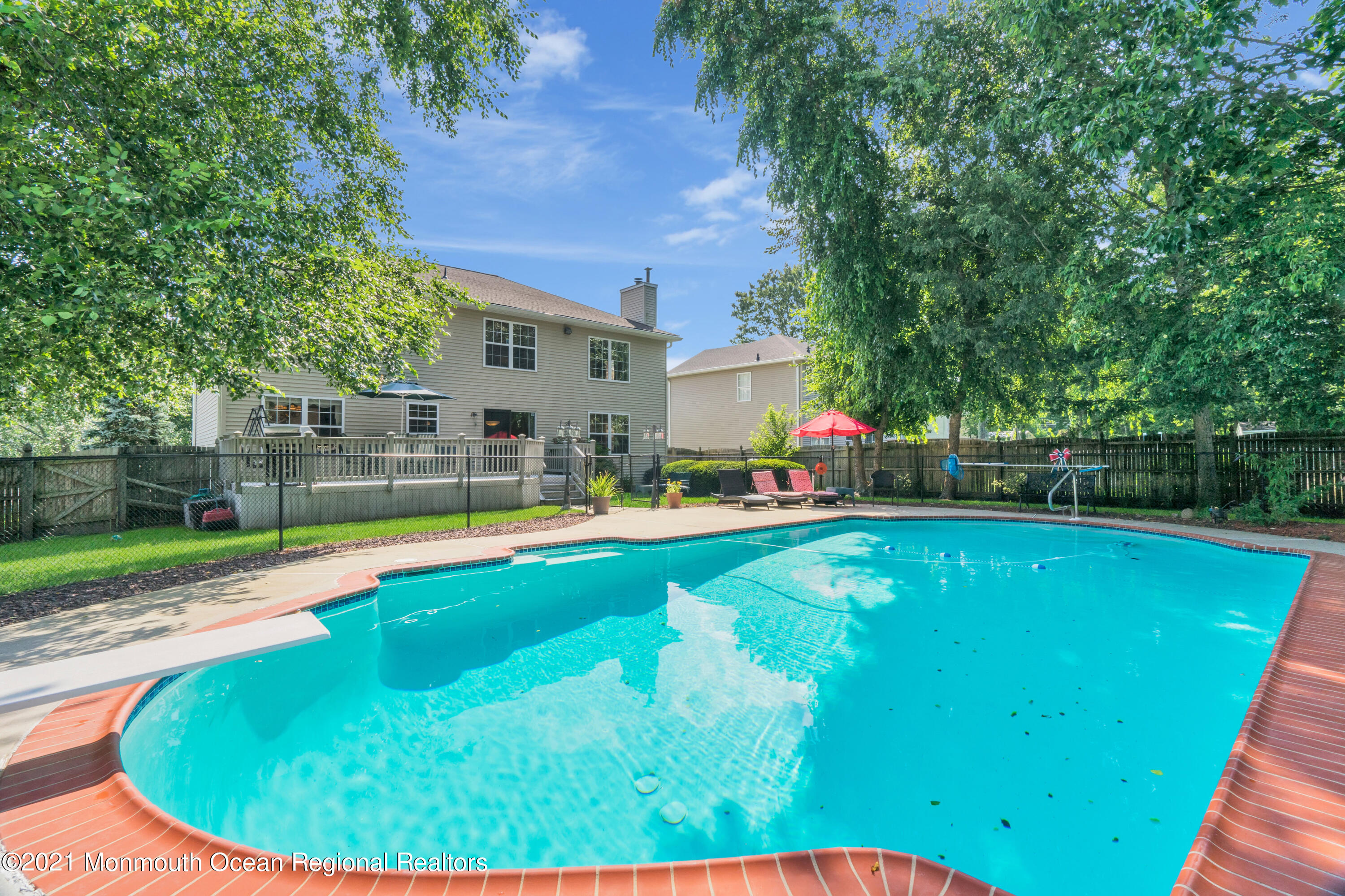 7 Sun Hollow Road Howell, NJ 07731 - Photo 28 of 31 a view of a swimming pool with a patio