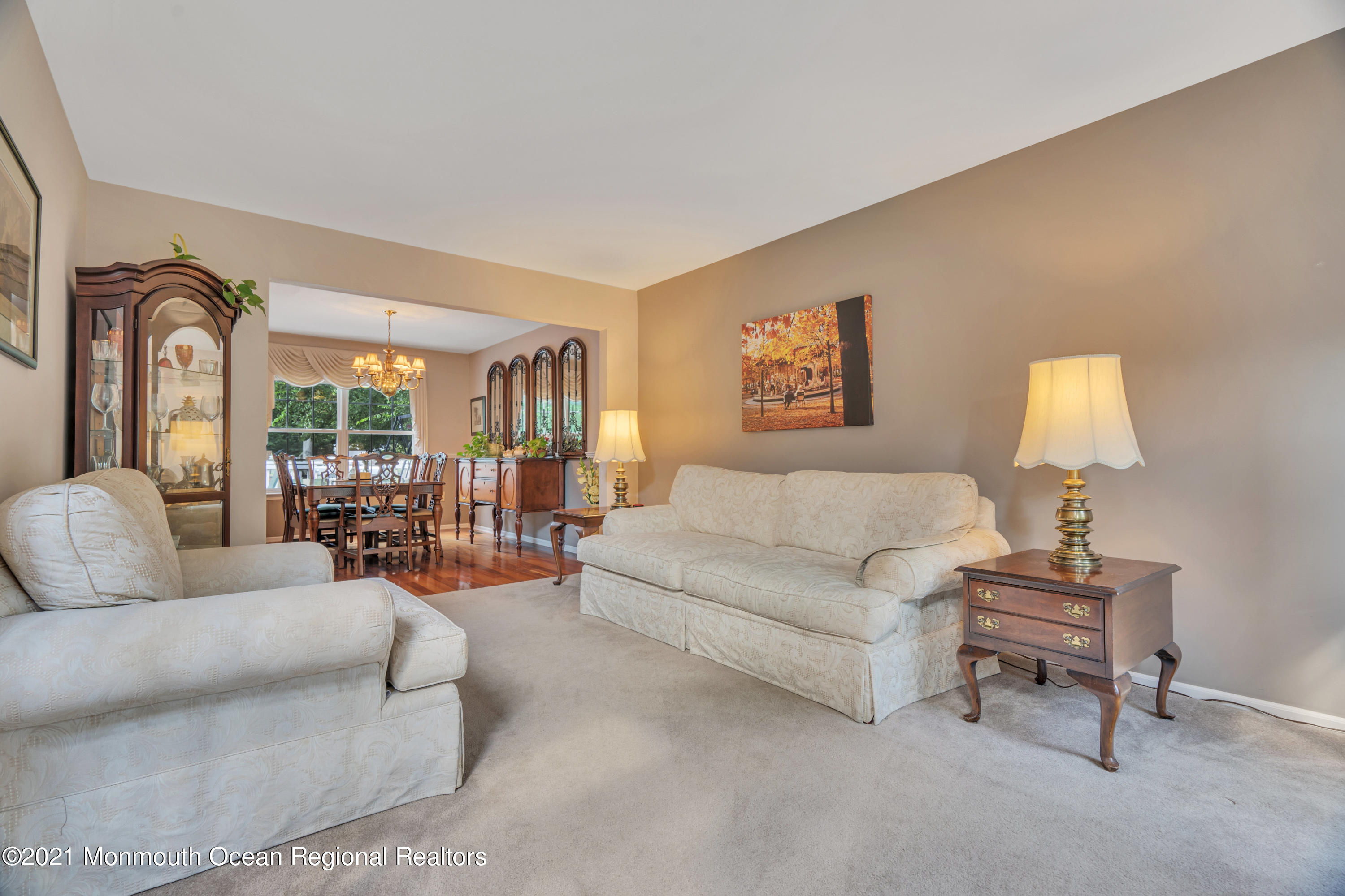 7 Sun Hollow Road Howell, NJ 07731 - Photo 4 of 31 a living room with furniture and a lamp