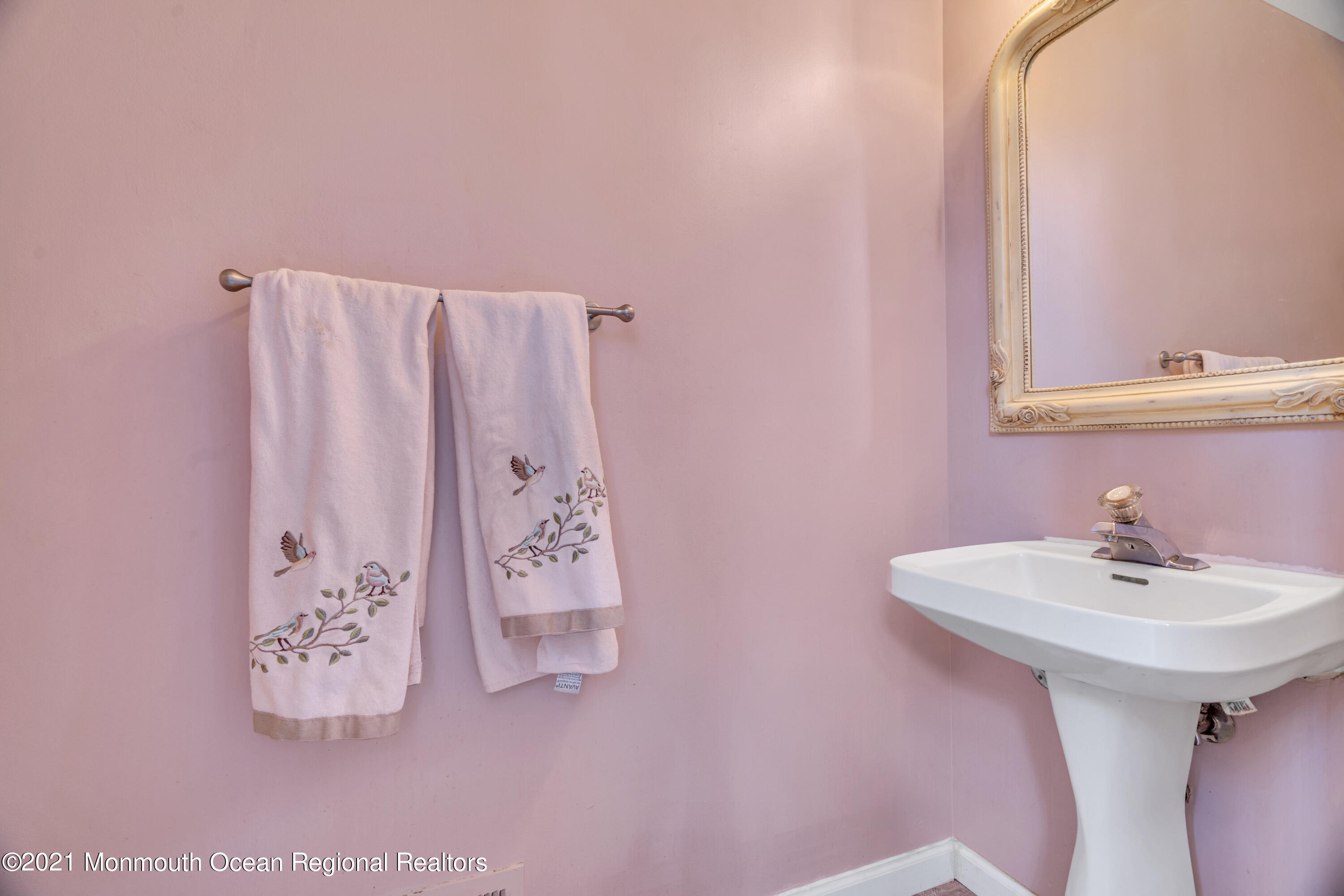 7 Sun Hollow Road Howell, NJ 07731 - Photo 8 of 31 a bathroom with a sink and a mirror